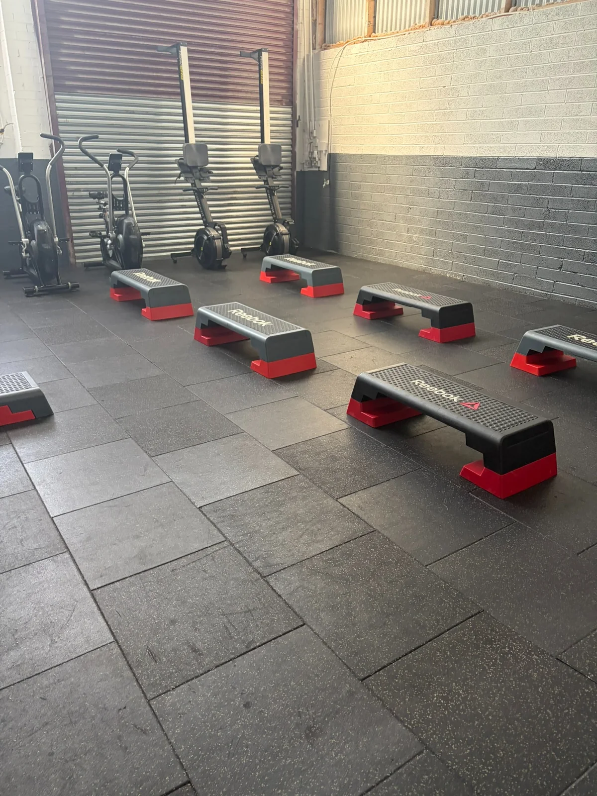 Step platforms arranged for a group fitness class